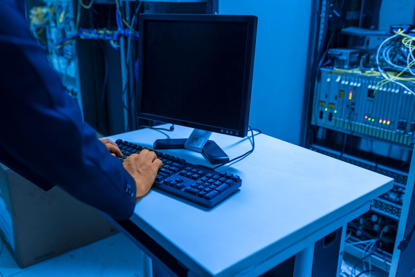 Engineer working in a server room